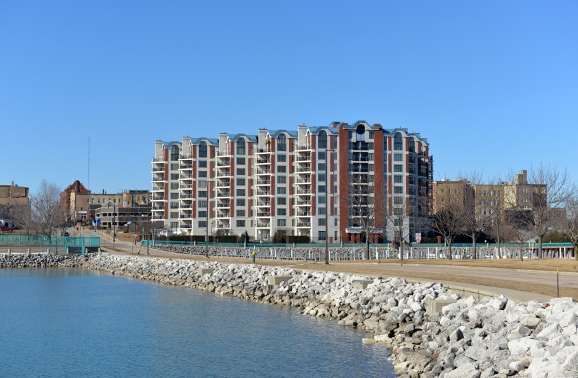 Enjoy lake views in this 2 bedroom, 2 bath condo situated steps - Beach Condo for sale in Racine, Wisconsin on Beachhouse.com