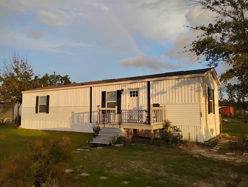 This charming 2023, 2-bedroom, 2-bathroom home sits on a - Beach Home for sale in Wewahitchka, Florida on Beachhouse.com