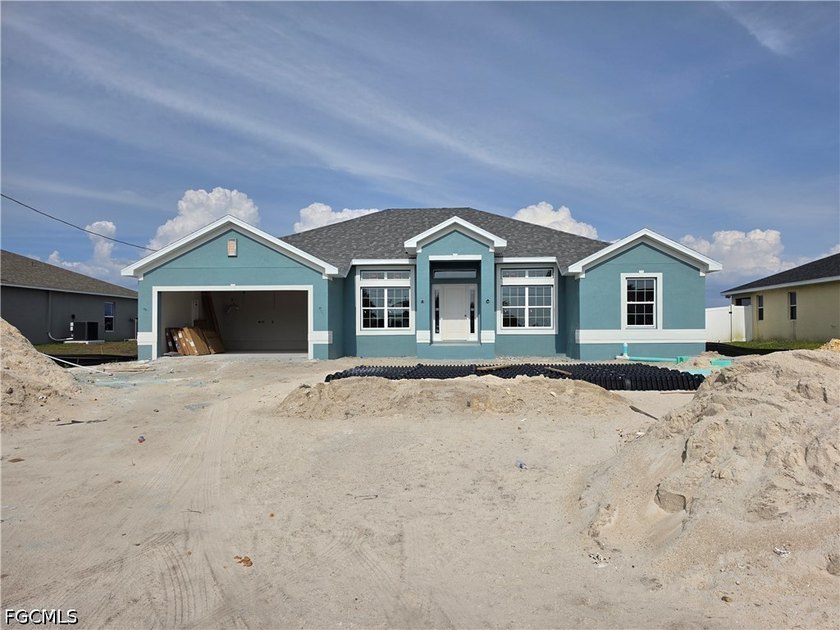 NEW CONSTRUCTION IN DESIRABLE NW CAPE CORAL! Welcome to your - Beach Home for sale in Cape Coral, Florida on Beachhouse.com