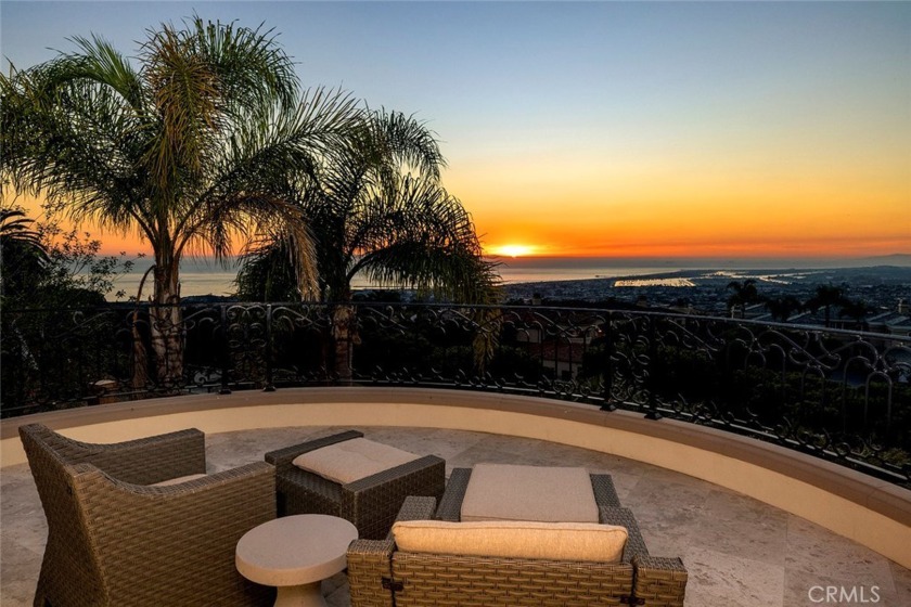 Perched atop a panoramic ocean view location with vistas that - Beach Home for sale in Newport Coast, California on Beachhouse.com