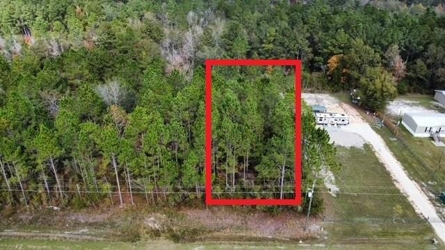 Discover the charm of Howard Creek with this freshly mulched - Beach Lot for sale in Wewahitchka, Florida on Beachhouse.com