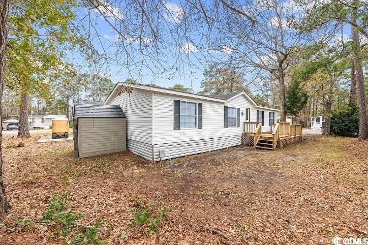 Welcome to this spacious and charming 3-bedroom, 2-full bath - Beach Home for sale in Murrells Inlet, South Carolina on Beachhouse.com