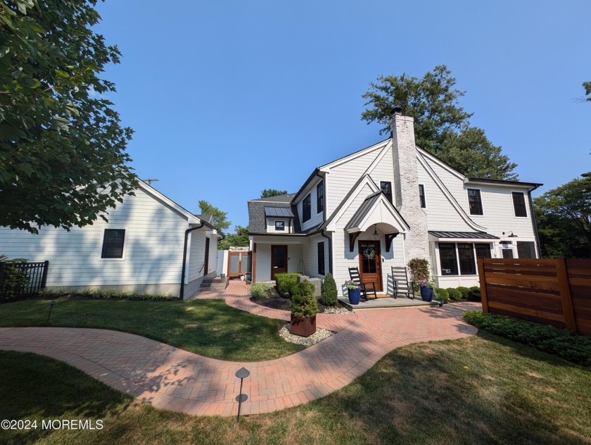 This charming storybook home, nestled on Deal Lake in the highly - Beach Home for sale in Ocean Township, New Jersey on Beachhouse.com