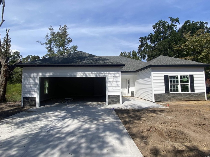 NEW HOME WITH NO HOA that walking distance to the community boat - Beach Home for sale in Murrells Inlet, South Carolina on Beachhouse.com