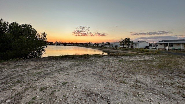 Riverview Lot with Private Dock - Your Florida Paradise Awaits! - Beach Lot for sale in North Fort Myers, Florida on Beachhouse.com