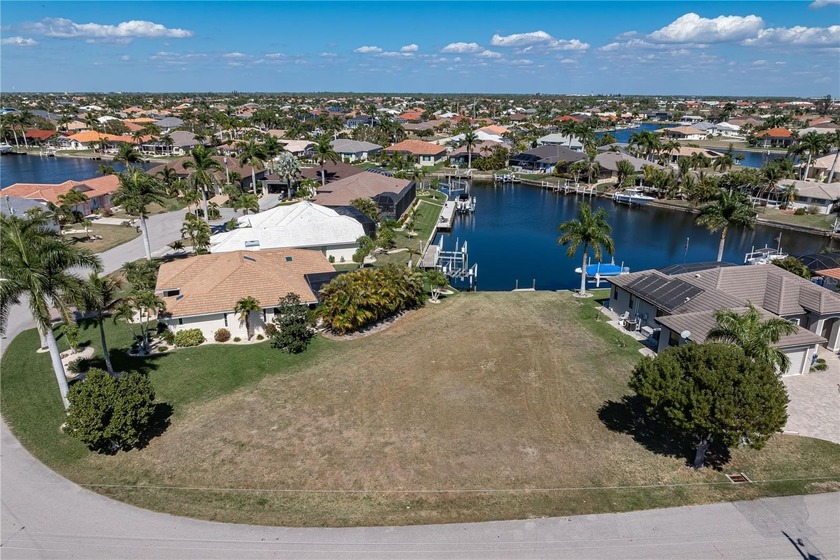 OVERSIZED SAILBOAT-ACCESS LOT ON WIDE CANAL BASIN IN BURNT STORE - Beach Lot for sale in Punta Gorda, Florida on Beachhouse.com