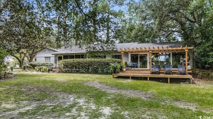 A rare in-town retreat, 910 Willowbank Rd pairs a classic 1920s - Beach Home for sale in Georgetown, South Carolina on Beachhouse.com
