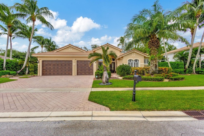 Exuding style and sophistication, this stunning home in The - Beach Home for sale in Wellington, Florida on Beachhouse.com