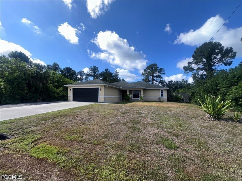 Tucked away on a private dead-end road, this well-maintained 3 - Beach Home for sale in Lehigh Acres, Florida on Beachhouse.com