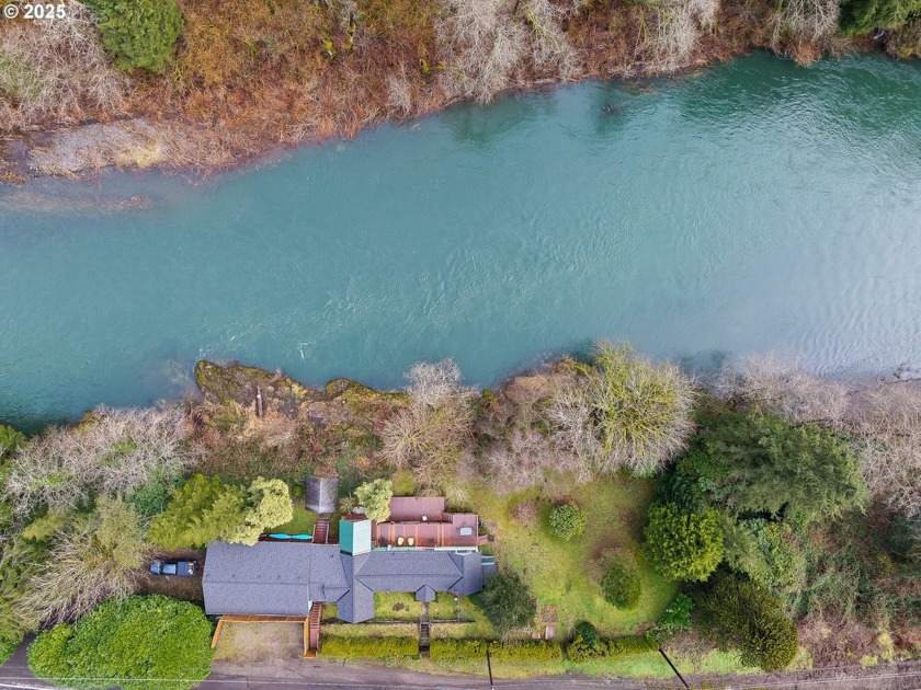 Nestled along 600 feet of the scenic Wilson River, this rare gem - Beach Home for sale in Tillamook, Oregon on Beachhouse.com