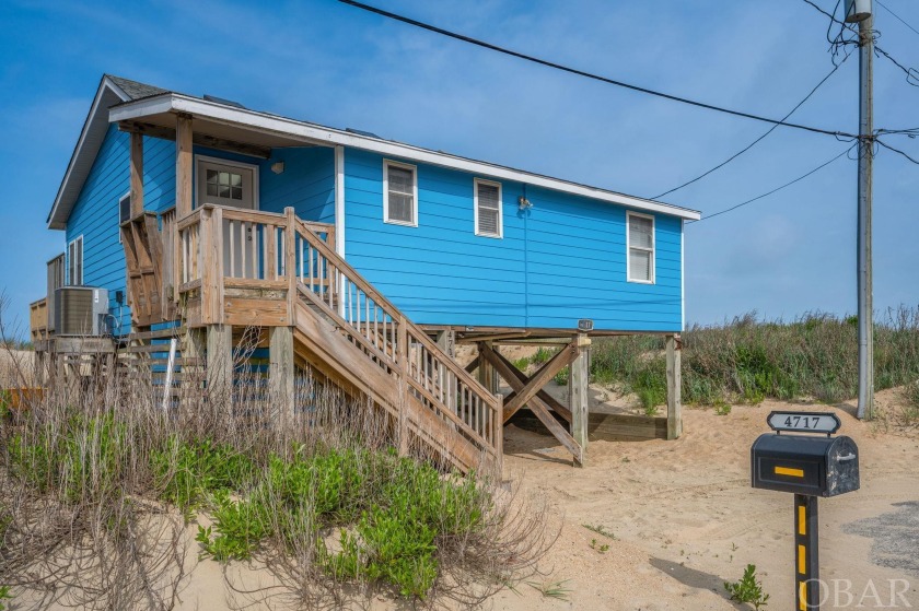 This oceanfront property is a three-bedroom, two-bathroom home - Beach Home for sale in Kitty Hawk, North Carolina on Beachhouse.com