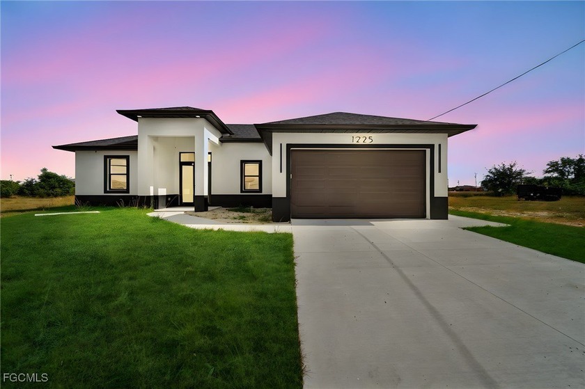 TRIPLE LOT! Brand-new WATERFRONT 4-bed, 2-bath home with CITY - Beach Home for sale in Cape Coral, Florida on Beachhouse.com