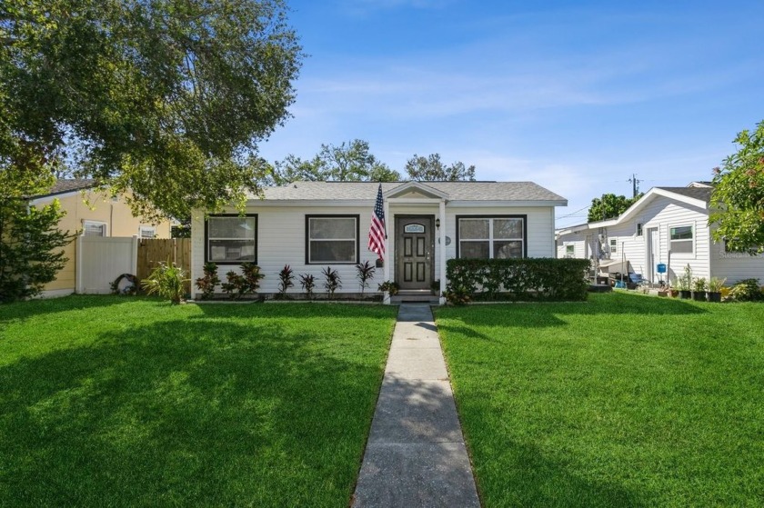 This charming home features a beautifully remodeled interior and - Beach Home for sale in St. Petersburg, Florida on Beachhouse.com