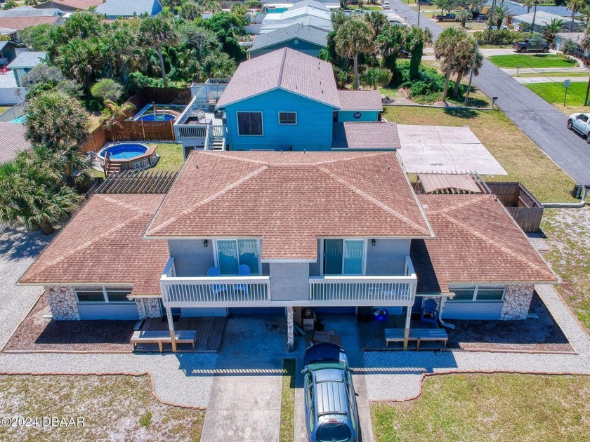 A RARE FIND BEACHSIDE and a opportunity for rental income. Live - Beach Townhome/Townhouse for sale in New Smyrna Beach, Florida on Beachhouse.com