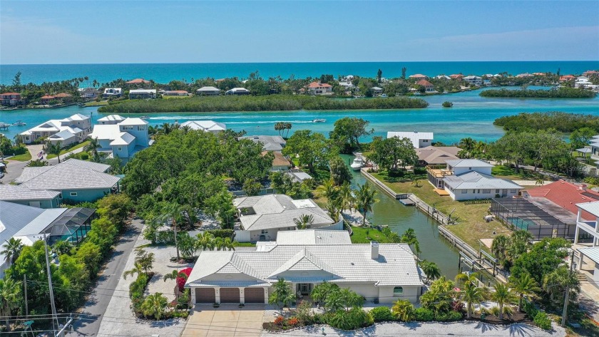 Exceptional waterfront home in a tropical oasis on a dredged - Beach Home for sale in Nokomis, Florida on Beachhouse.com