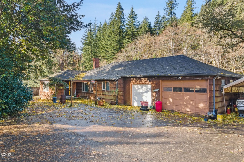 SALMON RIVER FRONTAGE!   Large, single level, home with 4 - Beach Home for sale in Otis, Oregon on Beachhouse.com
