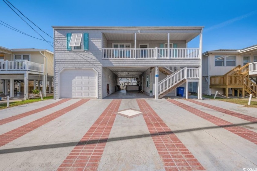 Discover a large, fully furnished waterfront channel house with - Beach Home for sale in North Myrtle Beach, South Carolina on Beachhouse.com