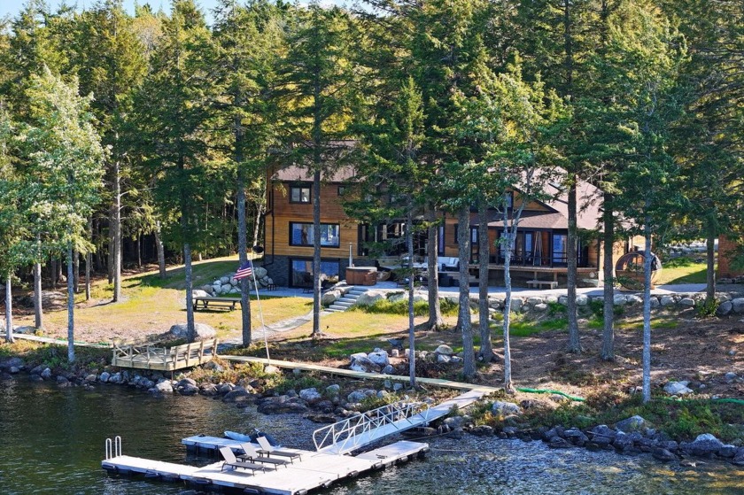 Welcome to this unique 3.4-acre lakefront retreat, fully - Beach Home for sale in Ellsworth, Maine on Beachhouse.com