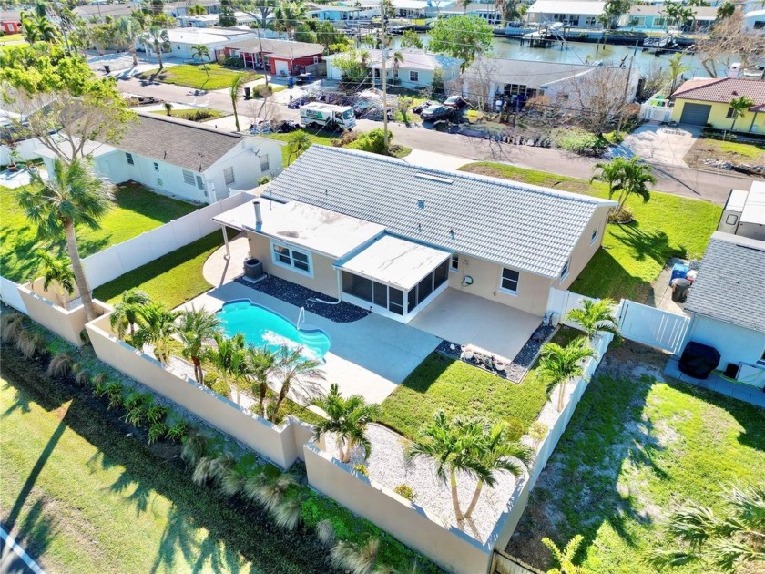 Discover your backyard oasis in this pool home, complete with a - Beach Home for sale in St. Petersburg, Florida on Beachhouse.com