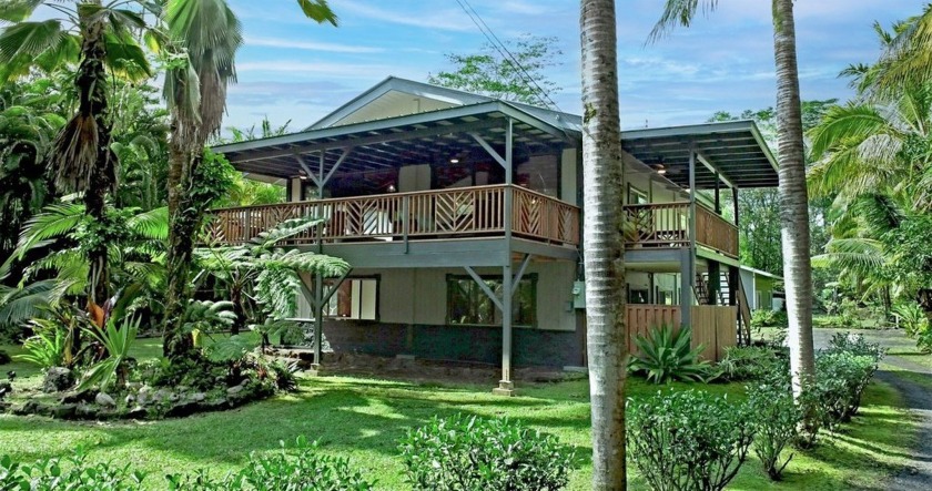 Nestled within a gated acre of mature landscaping, this property - Beach Townhome/Townhouse for sale in Pahoa, Hawaii on Beachhouse.com