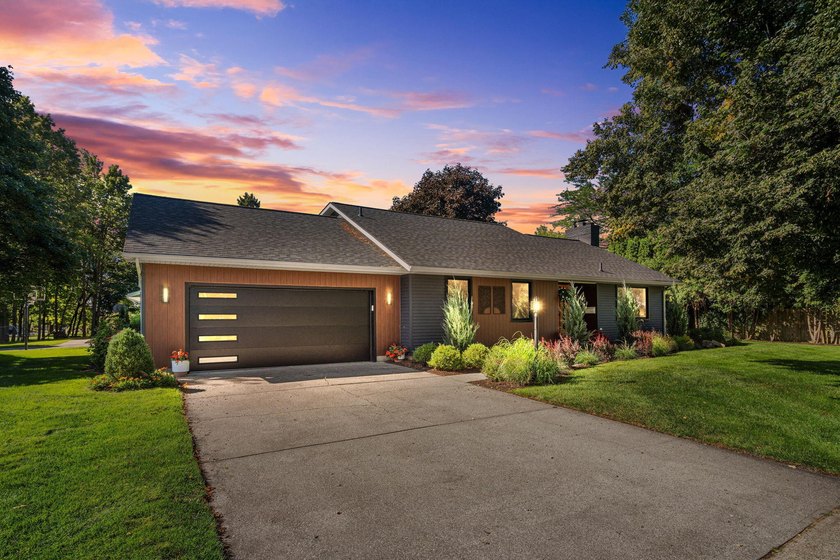 Tastefully renovated throughout with modern, clean sight lines - Beach Home for sale in Spring Lake, Michigan on Beachhouse.com
