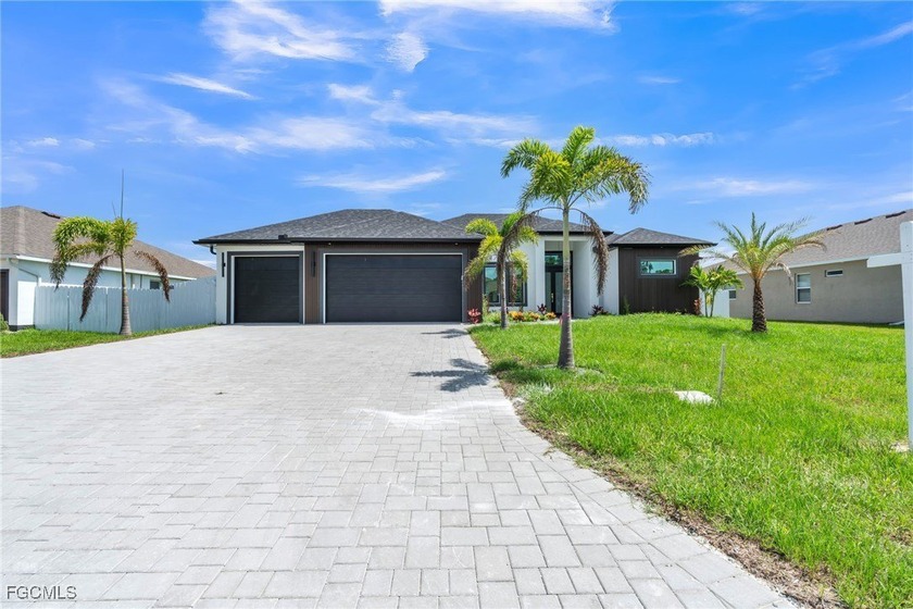 Welcome to this stunning new 4-bedroom, 3-bathroom home, where - Beach Home for sale in Cape Coral, Florida on Beachhouse.com