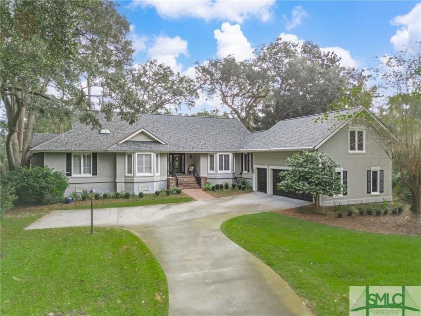 Beautiful home with stunning golf and Lagoon views situated on - Beach Home for sale in Savannah, Georgia on Beachhouse.com