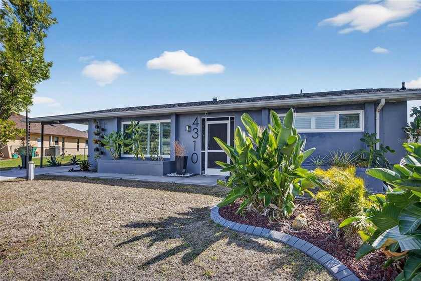 QUICK WATER ACCESS! Updated 2 bedroom, 2 bath waterfront home in - Beach Home for sale in Port Charlotte, Florida on Beachhouse.com