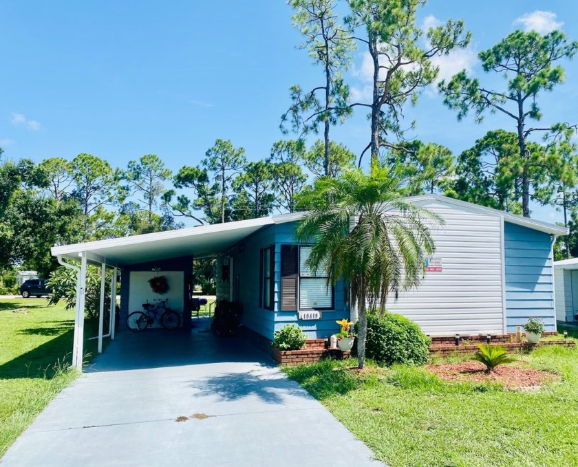 This home is located in Lake Fairways Country Club, a gated golf - Beach Home for sale in North Fort Myers, Florida on Beachhouse.com