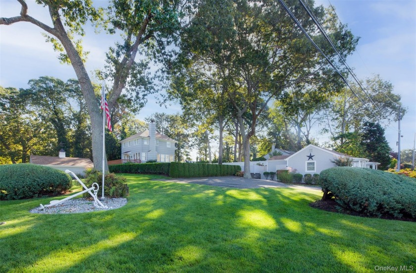 This property is a perfect opportunity as a Family Compound or - Beach Home for sale in Hampton Bays, New York on Beachhouse.com