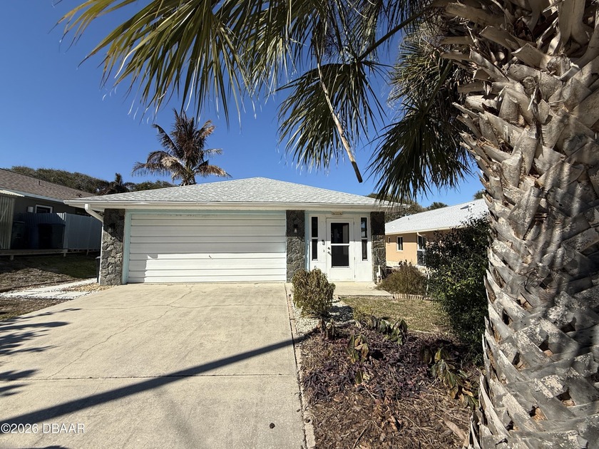 Charming coastal retreat. This furnished 3Bd, 2 Ba, 2 Car Garage - Beach Home for sale in New Smyrna Beach, Florida on Beachhouse.com