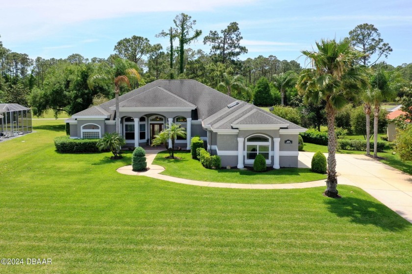 BUILT BY CUSTOM HOME BUILDER CHARLES RENICK in 2004, this - Beach Home for sale in Ormond Beach, Florida on Beachhouse.com