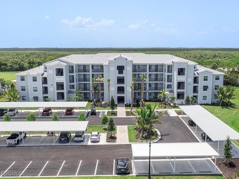 Experience effortless luxury with this Carolina model condo in - Beach Condo for sale in Punta Gorda, Florida on Beachhouse.com
