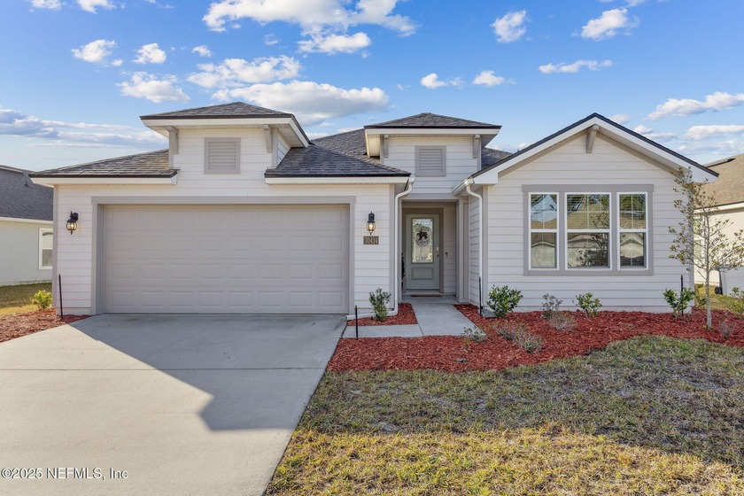 Welcome to this beautifully designed 4-bedroom, 3-bath home in - Beach Home for sale in Yulee, Florida on Beachhouse.com