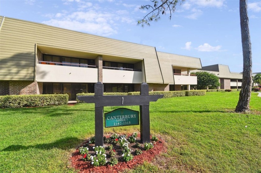 Deluxe Executive Suite-A2- GROUND floor Garden view . Steps away - Beach Condo for sale in Palm Harbor, Florida on Beachhouse.com