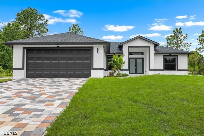 Discover this stunning brand new custom home in Lehigh Acres - Beach Home for sale in Lehigh Acres, Florida on Beachhouse.com