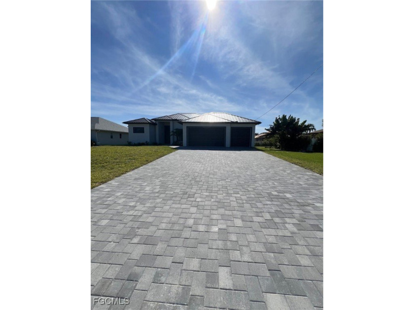 Stunning brand-new construction offering the perfect blend of - Beach Home for sale in Cape Coral, Florida on Beachhouse.com
