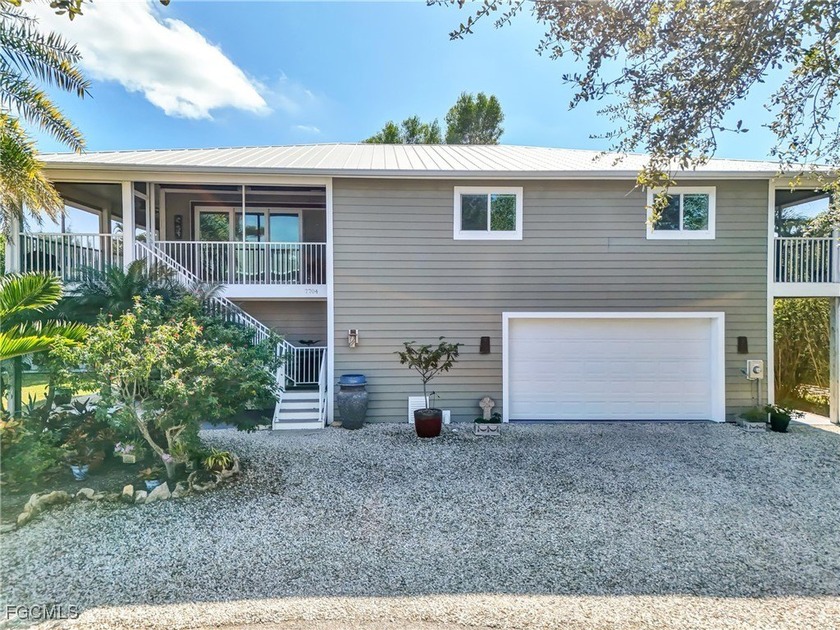 Extraordinary home with impeccable attention to detail. This - Beach Home for sale in Bokeelia, Florida on Beachhouse.com