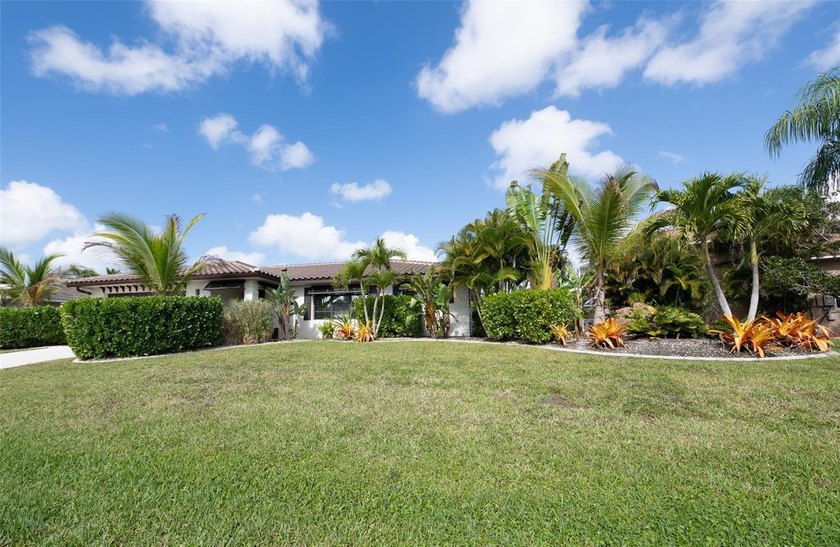 This renovated single-family home at 376 Portofino Drive offers - Beach Home for sale in Punta Gorda, Florida on Beachhouse.com