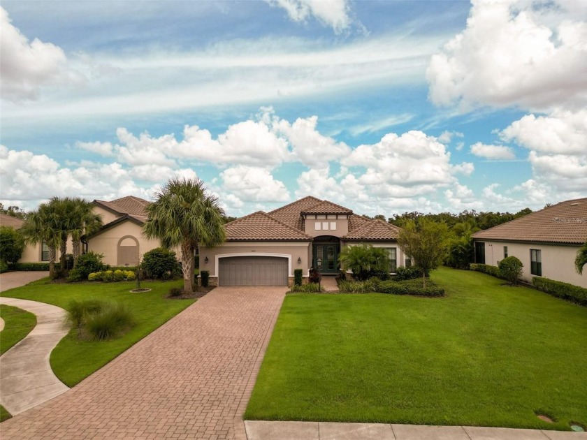 Discover the epitome of luxury living in this stunning Pallazio - Beach Home for sale in Bradenton, Florida on Beachhouse.com