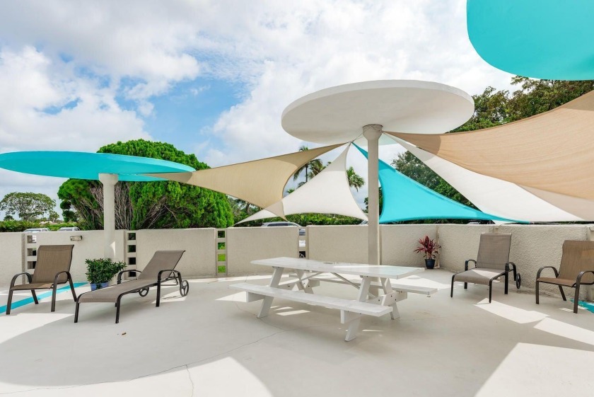Enjoy this bright fully furnished open 2 bedroom 2 bath corner - Beach Condo for sale in West Palm Beach, Florida on Beachhouse.com