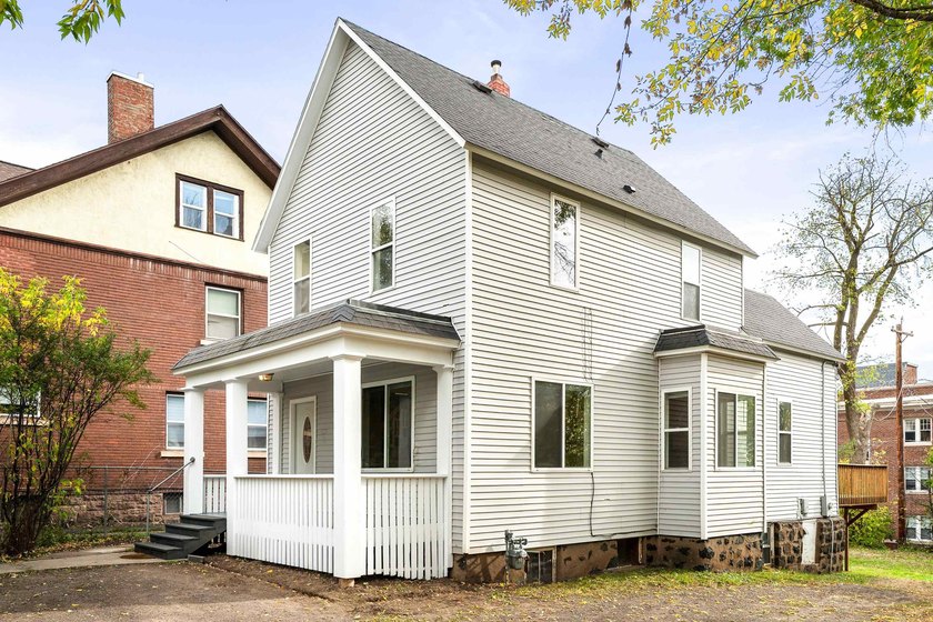 This spacious two-story offers a blend of classic character and - Beach Home for sale in Duluth, Minnesota on Beachhouse.com