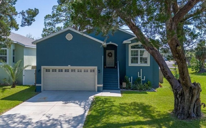 Welcome to 5352 Cotee River Drive! Built in 2021, this elevated - Beach Home for sale in New Port Richey, Florida on Beachhouse.com