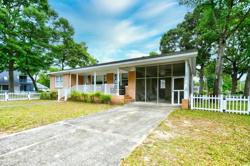 Step into your own piece of paradise with this charming beach - Beach Home for sale in Surfside Beach, South Carolina on Beachhouse.com