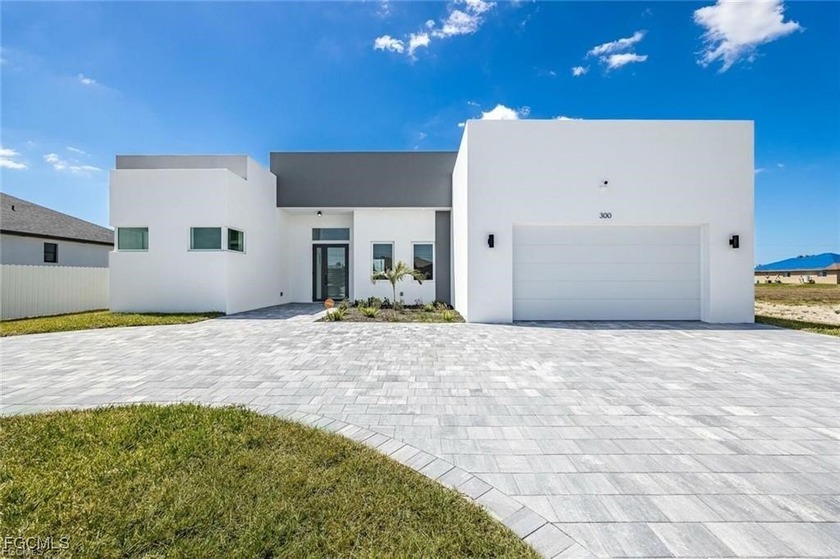 Experience modern elegance in this 2023 contemporary masterpiece - Beach Home for sale in Cape Coral, Florida on Beachhouse.com