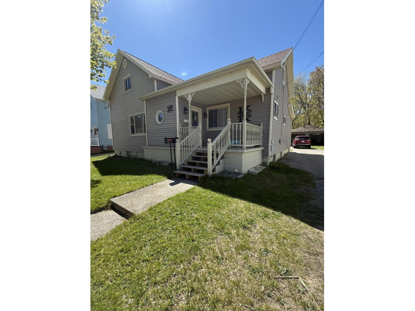 This is a rare opportunity home with so many great features. To - Beach Home for sale in Manistee, Michigan on Beachhouse.com