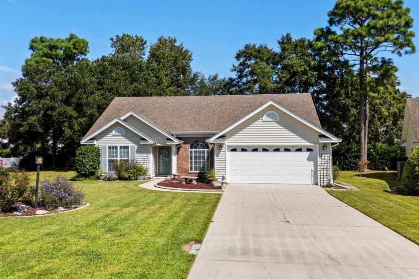 Welcome to this beautiful 3 bedroom 2 bath home nestled in the - Beach Home for sale in Surfside Beach, South Carolina on Beachhouse.com