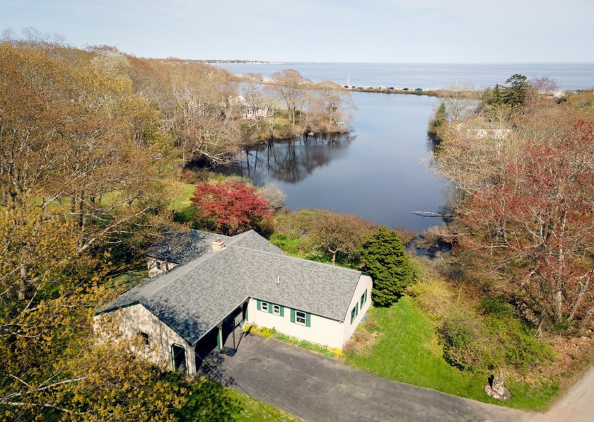 Nestled on the shore of Etherington Pond, looking out at - Beach Home for sale in Biddeford, Maine on Beachhouse.com