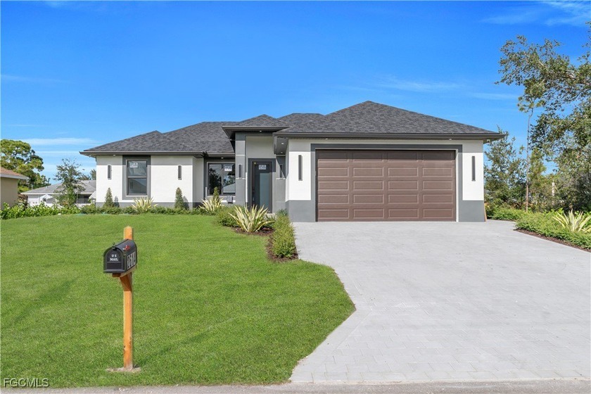 READY TO MOVE IN! This exceptional new construction home offers - Beach Home for sale in Lehigh Acres, Florida on Beachhouse.com