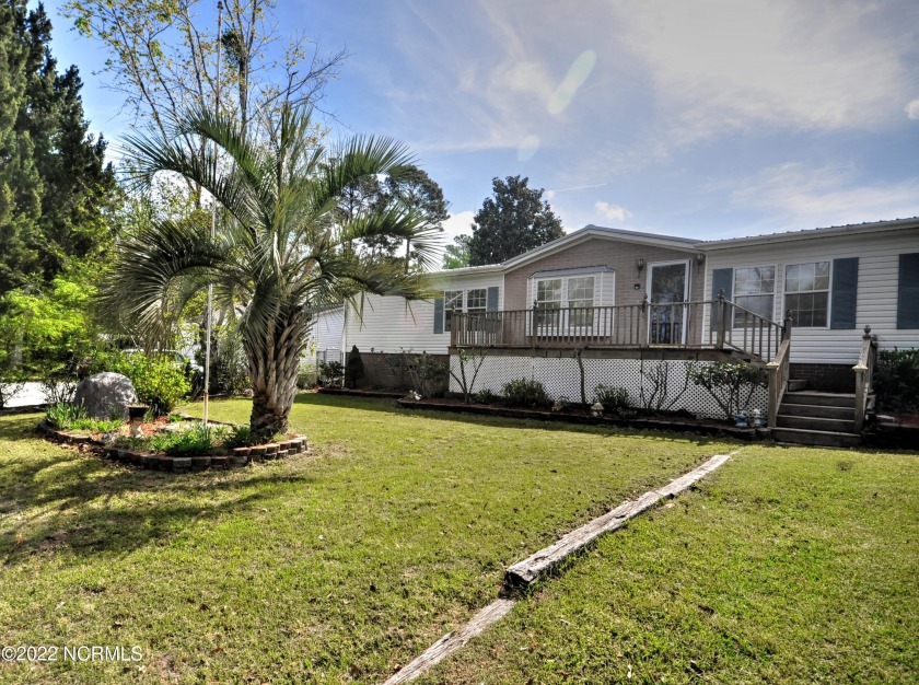 Situated on a corner lot in a quiet neighborhood, this home - Beach Home for sale in Shallotte, North Carolina on Beachhouse.com
